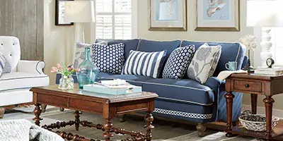 navy blue sofa in living room dark wood furniture accents