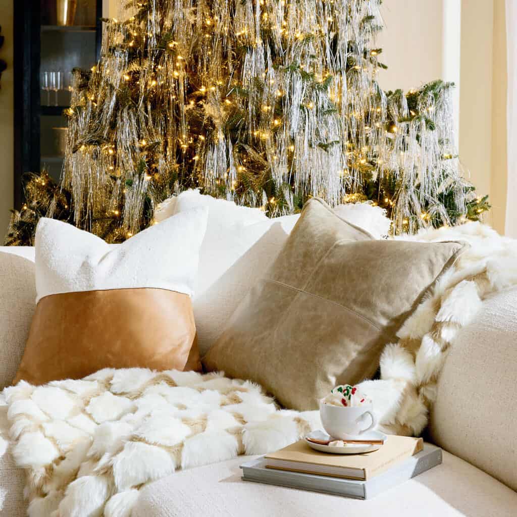holiday pillows and decor on a couch