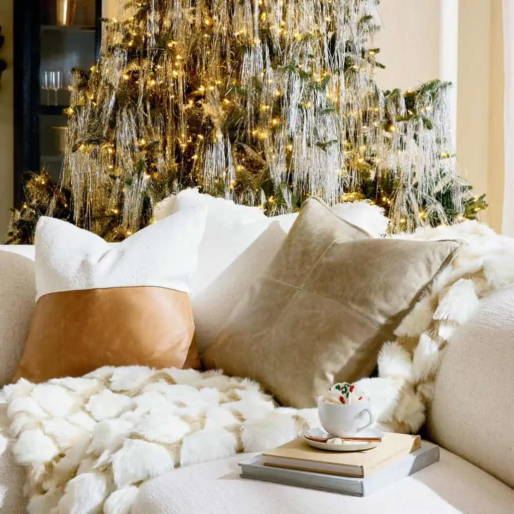 holiday pillows and decor on a couch
