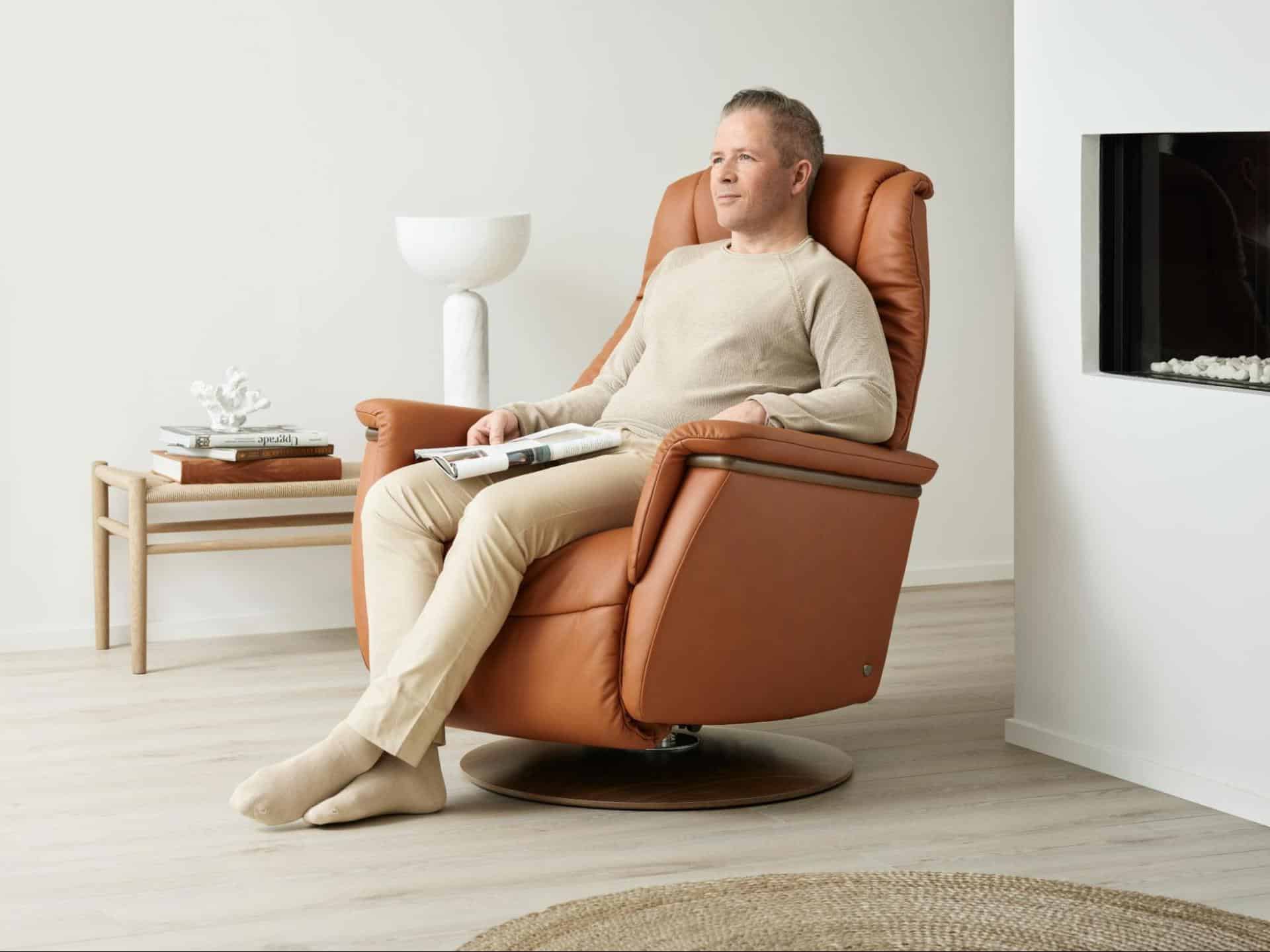 A man sits in a recliner