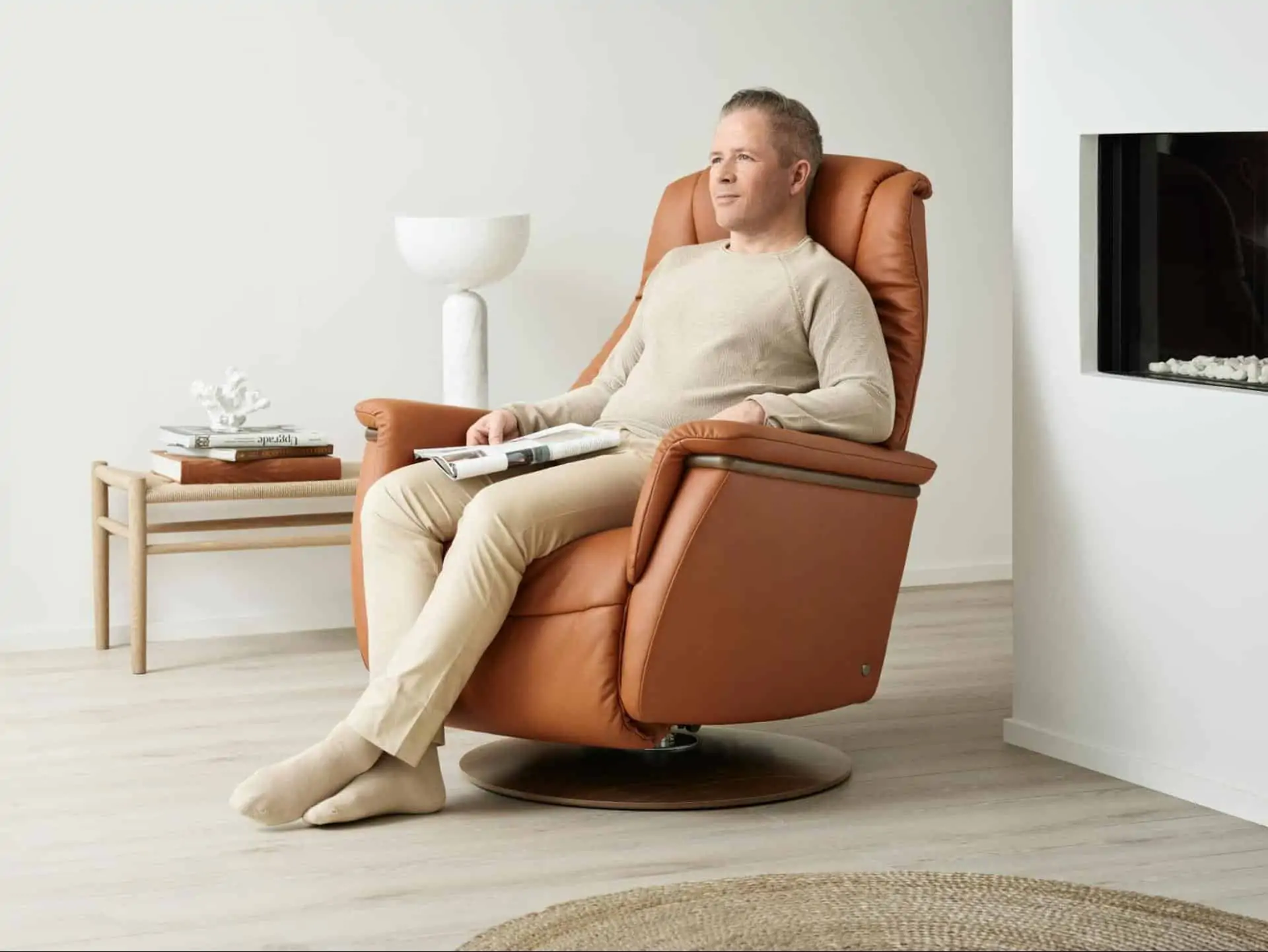 A man sits in a recliner