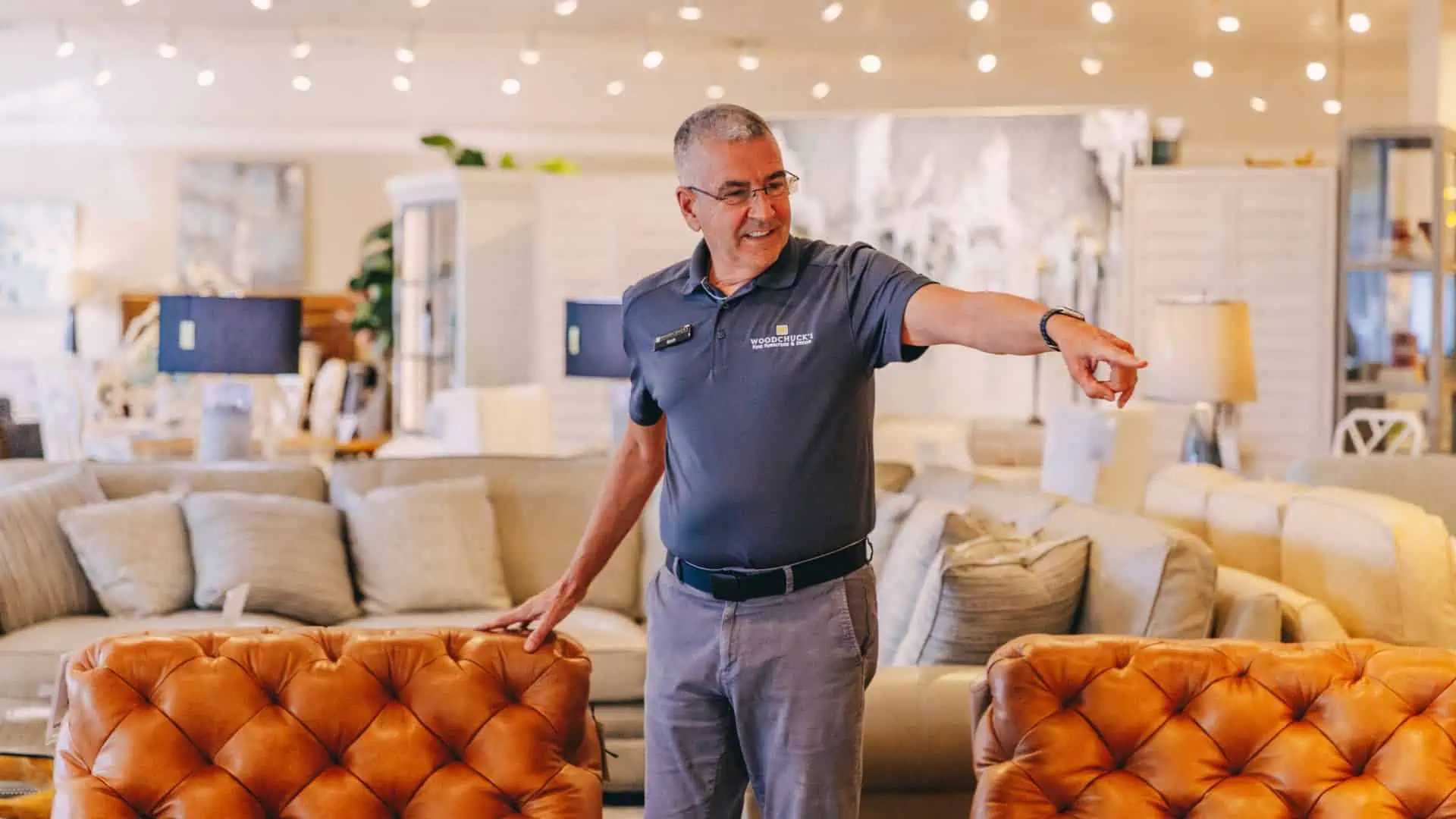 A Woodchuck's Furniture design consultant in the showroom 