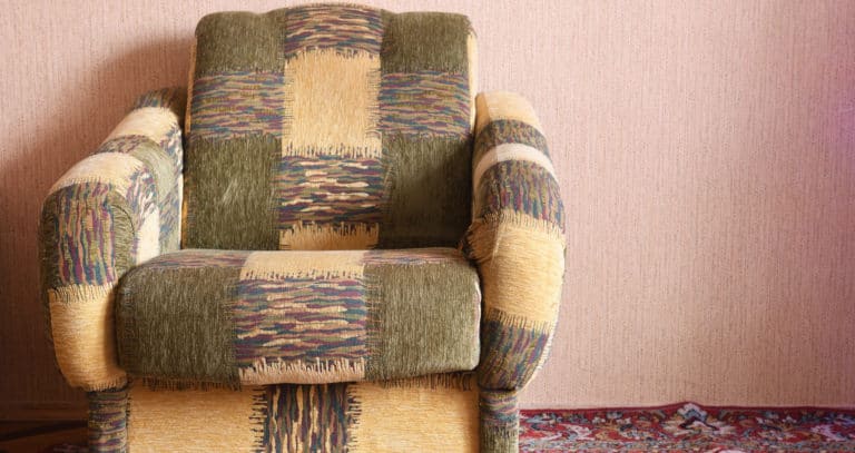 old upholstered armchair