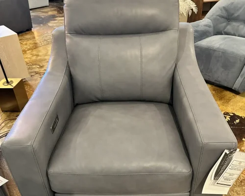A modern gray recliner equipped with a power headrest for enhanced support and comfort.
