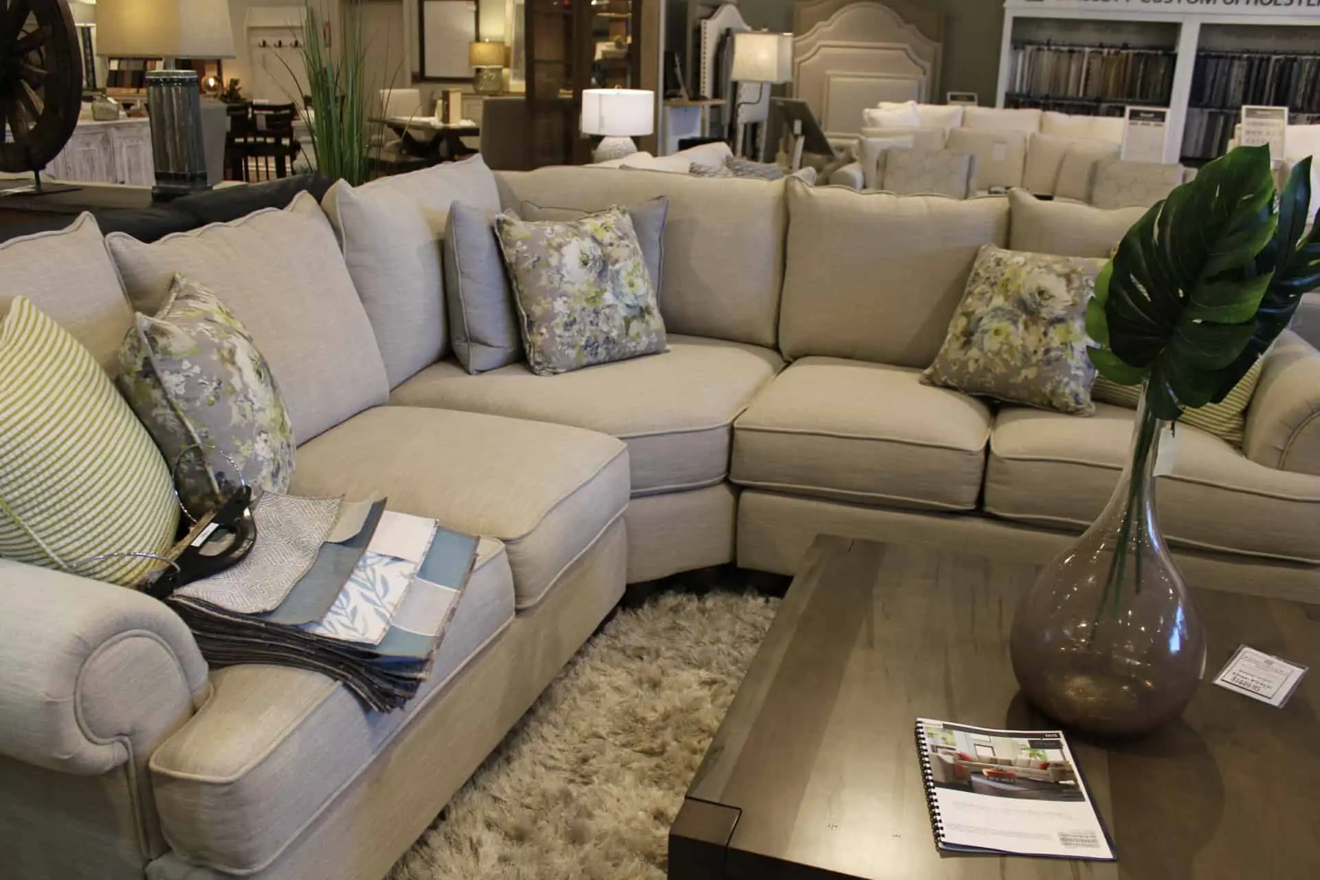 A sectional sofa with pillows