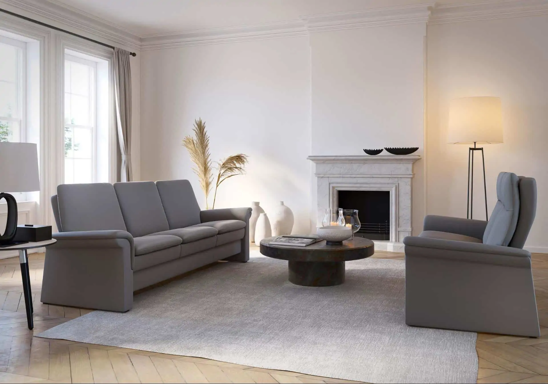 living room with gray couch and arm chair facing each other