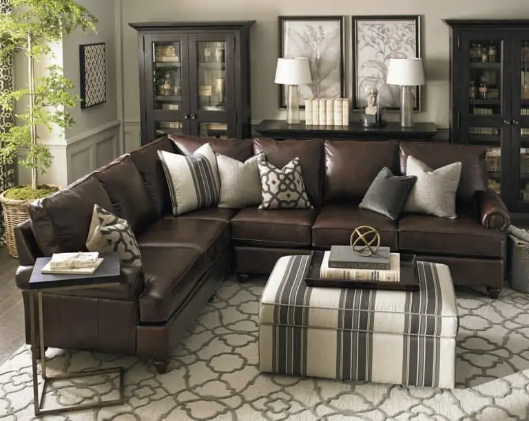 leather sofa dark wood cabinets living room