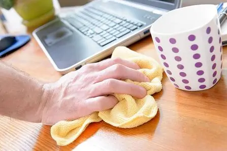 Cleaning desk computer coffee mug