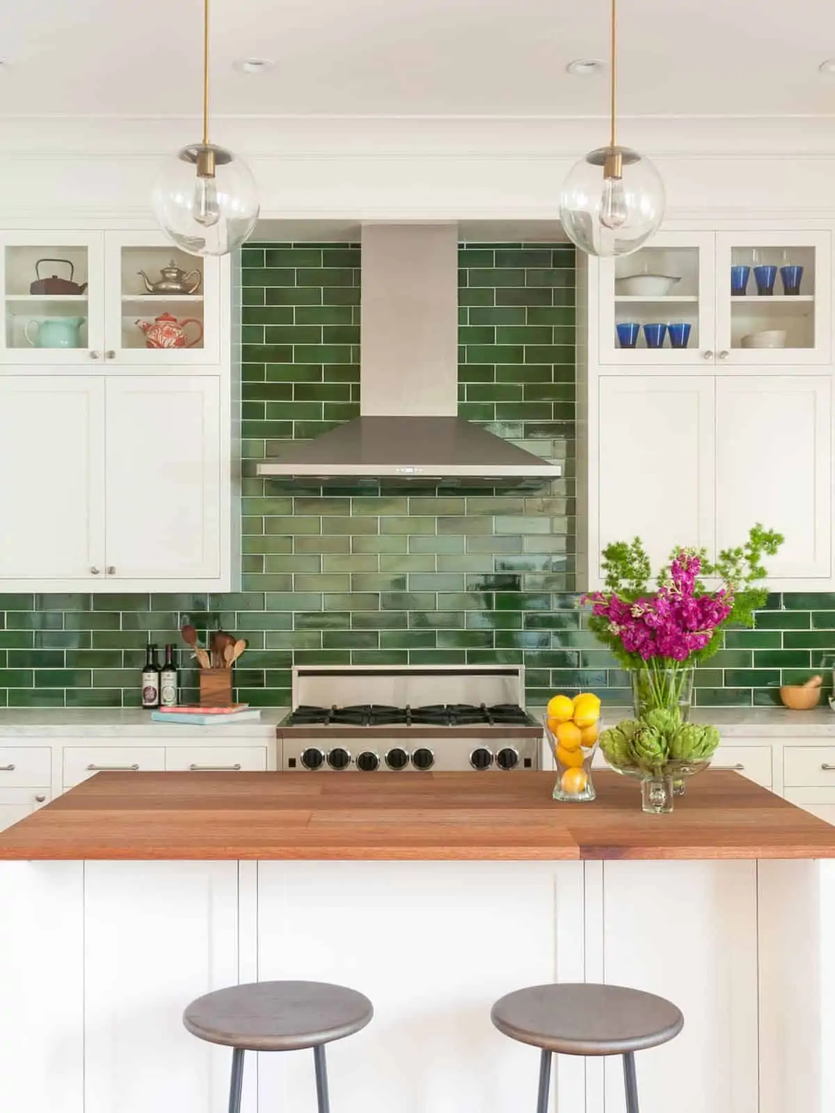 kitchen with green tile backsplash